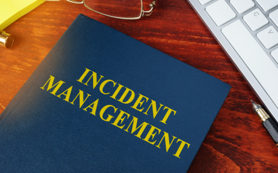 An 'Incident Management' titled blue folder on a desk.
